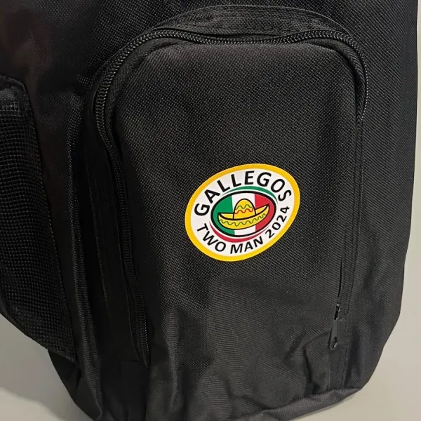 Black backpack with a round Gallegos Two Man 2024 patch