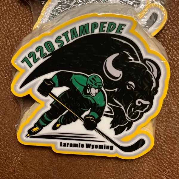 7220 Stampede patch with a hockey player and a bison, Laramie Wyoming