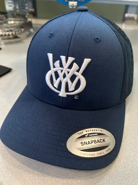 Navy trucker cap with the WYO monogram embroidered in white